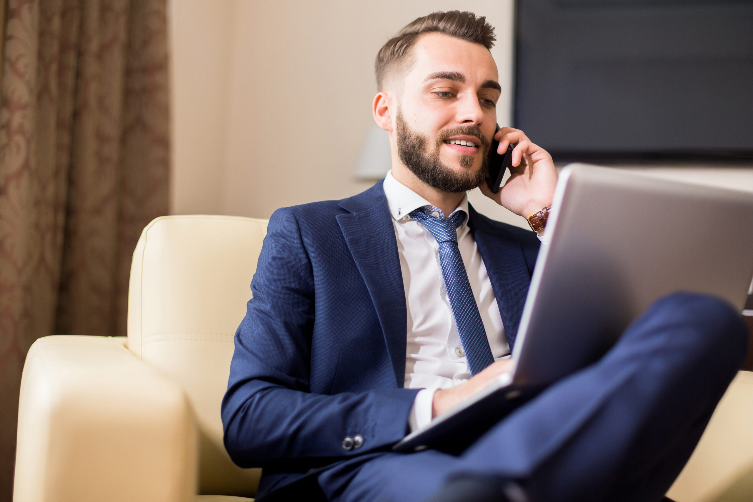 Successful  Businessman Working with Laptop